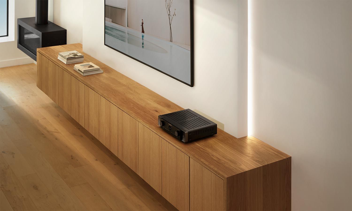 Modern living room with wooden media console and black audio receiver