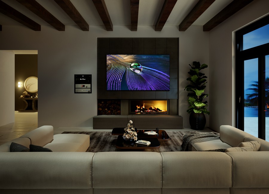 A living room with a Sony flat-screen TV above the fireplace.