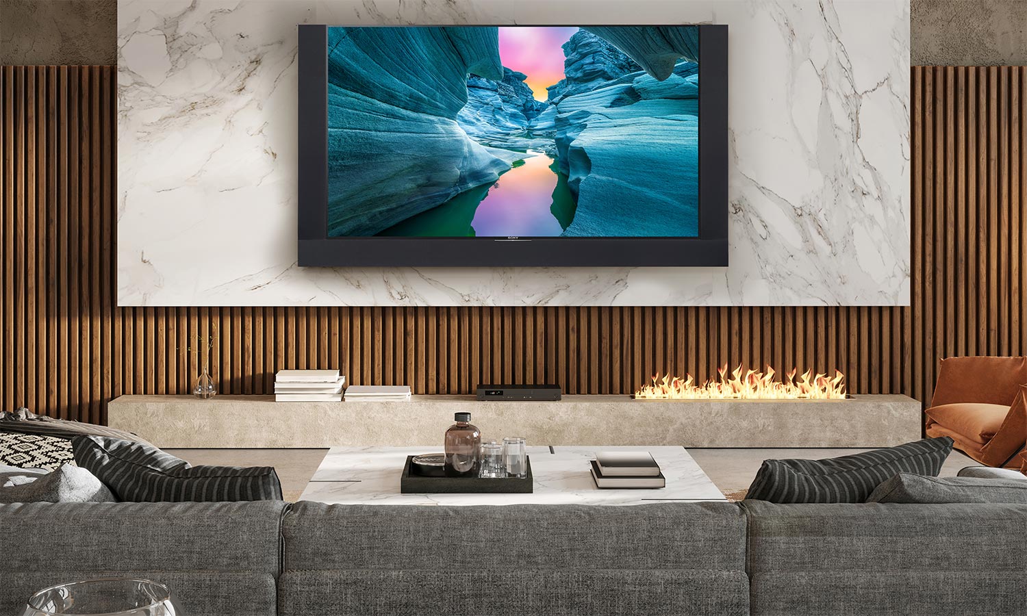 Luxurious living room with large screen TV above fireplace